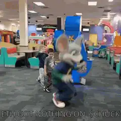 Chuck E. Cheese mascot dancing