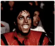 Michael Jackson smiling and eating