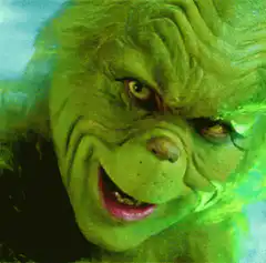 The Grinch smirking and nodding