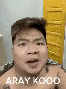 Man facepalms with ARAY KOOO text