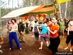 people dancing at an outdoor festival