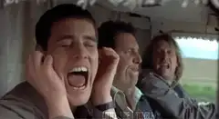 Three men screaming in a car