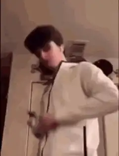 Man holding up a credit card