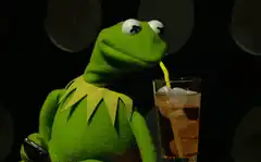 Kermit the Frog sipping a drink