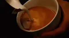 Latte art being poured