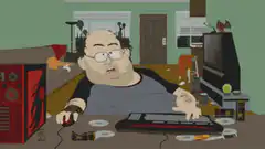 Fat guy playing computer