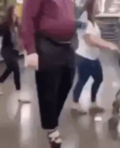 Man dancing in Walmart aisle