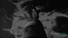 Man standing on top of a rocket