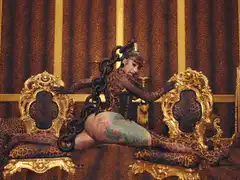 Woman chained between two ornate chairs