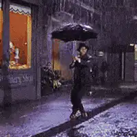 Man fighting strong wind in rain