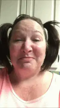 Woman with pigtails making funny faces