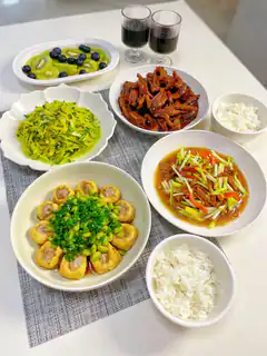 Chinese home-cooked meal with rice and dishes