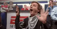 Elvis impersonator excitedly waving