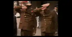 Two men in military uniforms saluting