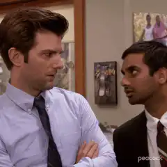 Andy and Raj suspicious stare