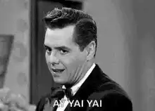 Man reacts with shock and says ay yai yai