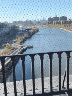 River view through chain-link fence