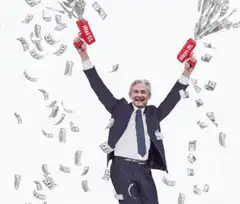Man celebrating with money and red cards