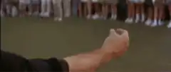 Hank Azaria points at caddy