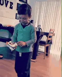 Boy laughing hysterically