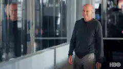 Bryan Cranston points at camera