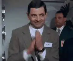 Mr. Bean clapping awkwardly