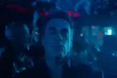 Jon Hamm dancing in a club
