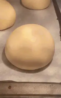 dough rising and baking in oven