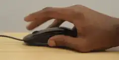 Hand using a computer mouse