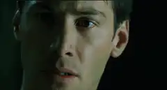 Matrix Neo punches Agent Smith