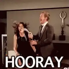 Man and woman spraying champagne