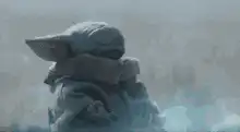 Baby Yoda statue shivering