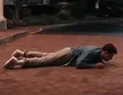 Man crawling on patio
