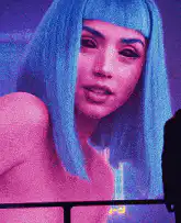 Woman with blue hair posing