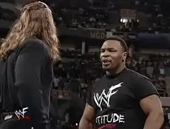 Mike Tyson and Triple H stare down