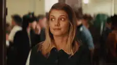 Mae Whitman smirking