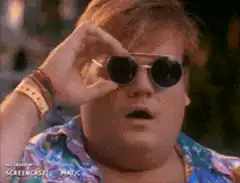 Dewey Cox lifts sunglasses