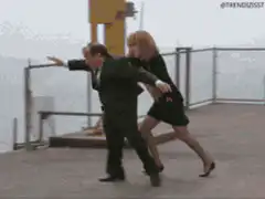 Woman punches man off a pier