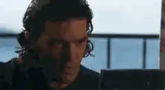 Man kisses a fist
