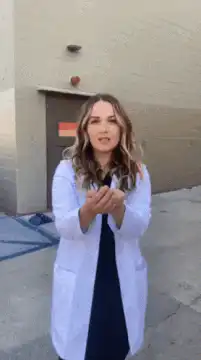 Woman blowing soap bubbles