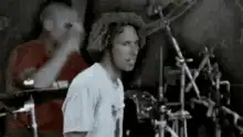 Lars Ulrich drumming intensely