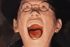Man screaming with blood pouring from mouth