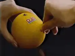 Orange popsicle pops out of orange