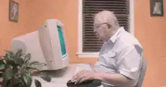 Old man clicks My Computer