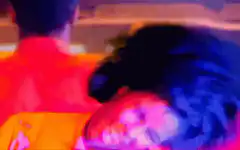 woman laughing hysterically in club