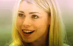 Blonde woman smiling and laughing