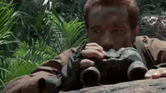 Arnold Schwarzenegger looking through binoculars