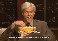 Bill Hader eating popcorn loving the show