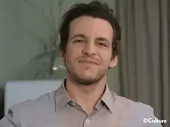 Man winking and blowing a kiss