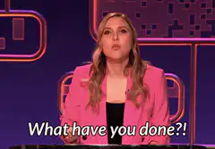 Woman in pink jacket says what have you done